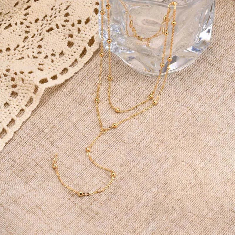 Gargantilla doble con colgante de gota